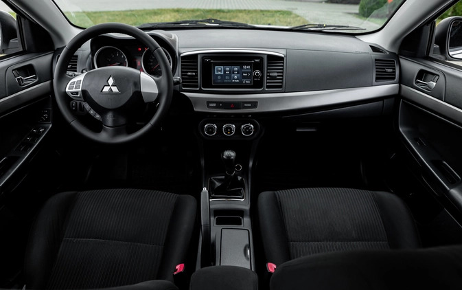 Mitsubishi Lancer cena 32900 przebieg: 150000, rok produkcji 2014 z Radom małe 596